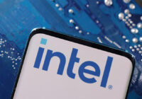 A smartphone with an Intel logo displayed is placed on a computer motherboard in this illustration created on March 6, 2023. REUTERS/Dado Ruvic/Illustration/File Photo