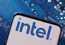 A smartphone with an Intel logo displayed is placed on a computer motherboard in this illustration created on March 6, 2023. REUTERS/Dado Ruvic/Illustration/File Photo