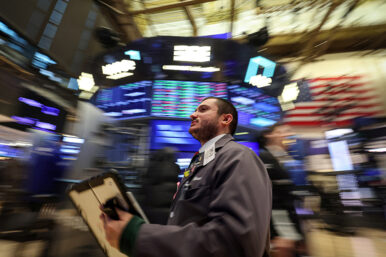 Traders work on the floor at the New York Stock Exchange (NYSE) in New York City, U.S., January 26, 2026. REUTERS/Brendan McDermid