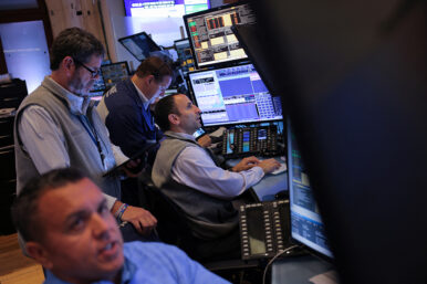 Traders work on the trading floor at The New York Stock Exchange (NYSE) following the Federal Reserve rate announcement, in New York City, U.S., September 18, 2024. REUTERS/Andrew Kelly