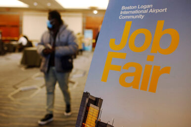 A job seeker leaves the job fair for airport related employment at Logan International Airport in Boston, Massachusetts, U.S., December 7, 2021. REUTERS/Brian Snyder
