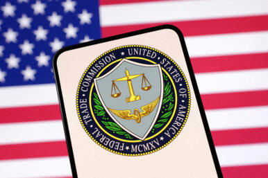 United States Federal Trade Commission logo and U.S. flag are seen in this illustration created on April 23, 2025. REUTERS/Dado Ruvic/Illustration/File Photo