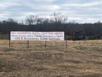 A large banner in Sand Springs, Oklahoma, expresses opposition to a data center proposed for the area. MUST CREDIT: Evan Halper/The Washington Post