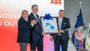 L to R: Henrico County Manager John Vithoulkas, ABB’s Franklin Sullivan and former Henrico EDA head Anthony Romanello celebrate ABB’s expansion. Official photo by Kaitlyn DeHarde, Office of Gov. Glenn Youngkin