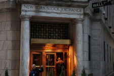 A man walks into the New York Stock Exchange (NYSE) building in New York City, U.S., March 11, 2025. REUTERS/Shannon Stapleton
