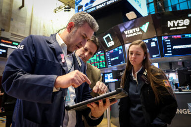 Traders work on the floor at the New York Stock Exchange (NYSE) in New York City, U.S., January 21, 2026. REUTERS/Brendan McDermid
