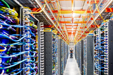 A technician works at an Amazon Web Services AI data center in New Carlisle, Indiana, U.S., October 2, 2025. REUTERS/Noah Berger for AWS/File Photo