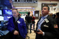 Traders work on the floor at the New York Stock Exchange (NYSE) in New York City, U.S., February 9, 2026. REUTERS/Brendan McDermid