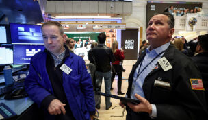 Traders work on the floor at the New York Stock Exchange (NYSE) in New York City, U.S., February 9, 2026. REUTERS/Brendan McDermid
