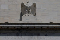 An eagle tops the U.S. Federal Reserve building's facade, as U.S. President Donald Trump said he was firing Federal Reserve Governor Lisa Cook over alleged improprieties in obtaining mortgage loans, in Washington, D.C., U.S., August 26, 2025. REUTERS/Brian Snyder