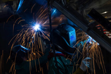 Workers weld at a factory floor in Columbus, Ohio, U.S., March 26, 2024. REUTERS/Carlos Barria