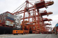A cargo ship bound for Japan is moored at the Centerm container ship terminal at the Port of Vancouver in Vancouver, British Columbia, Canada August 3, 2025. REUTERS/Chris Helgren