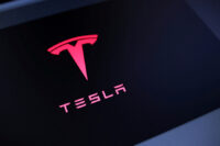 FILE PHOTO: Tesla logo is seen in this illustration taken July 23, 2025. REUTERS/Dado Ruvic/Illustration/File Photo