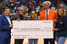 Charlie Hill, second from right, pledged $1.5 million to Virginia State University, his alma mater, during halftime of a VSU basketball game Feb. 21, 2026.