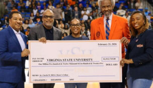 Charlie Hill, second from right, pledged $1.5 million to Virginia State University, his alma mater, during halftime of a VSU basketball game Feb. 21, 2026.