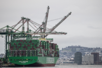 Shipping containers are stacked on a cargo ship at the port of Oakland following the Supreme Court's ruling that Trump had exceeded his authority when he imposed tariffs, in Oakland, California, U.S., February 24, 2026. REUTERS/Carlos Barria