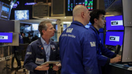 Traders work on the floor at the New York Stock Exchange (NYSE) in New York City, U.S. February 24, 2026. REUTERS/Jeenah Moon