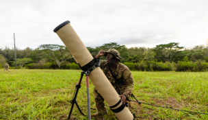 A U.S. Army Soldier with the 25th Infantry Division inspects a Switchblade launch tube during a Joint Pacific Multinational Readiness Center rotation on Nov. 6, 2025, at Schofield Barracks, Hawaii. U.S. Army photo by Sgt. Taylor Gray.