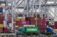 Shipping containers at the port of Oakland, California, following the Supreme Court's ruling that Trump had exceeded his authority when he imposed tariffs, Feb. 23, 2026. Photo by REUTERS/Carlos Barria