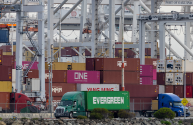 Shipping containers at the port of Oakland, California, following the Supreme Court's ruling that Trump had exceeded his authority when he imposed tariffs, Feb. 23, 2026. Photo by REUTERS/Carlos Barria