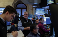 Traders work on the floor at the New York Stock Exchange (NYSE) in New York City on Feb. 24, 2026. Photo by REUTERS/Jeenah Moon