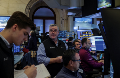 Traders work on the floor at the New York Stock Exchange (NYSE) in New York City on Feb. 24, 2026. Photo by REUTERS/Jeenah Moon