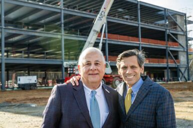 VCU Health CEO Dr. Marlon Levy and VCU President Michael Rao attend a topping-off ceremony March 4 for Chesterfield Pavilion, expected to be completed in 2027. Photo by Dean Hoffmeyer, courtesy VCU Enterprise Marketing and Communications