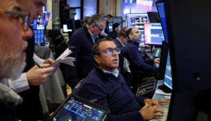 Traders work on the floor at the New York Stock Exchange (NYSE) in New York City, U.S., March 2, 2026. REUTERS/Brendan McDermid