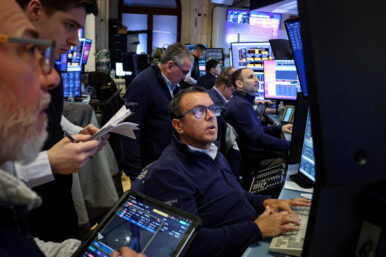 Traders work on the floor at the New York Stock Exchange (NYSE) in New York City, U.S., March 2, 2026. REUTERS/Brendan McDermid