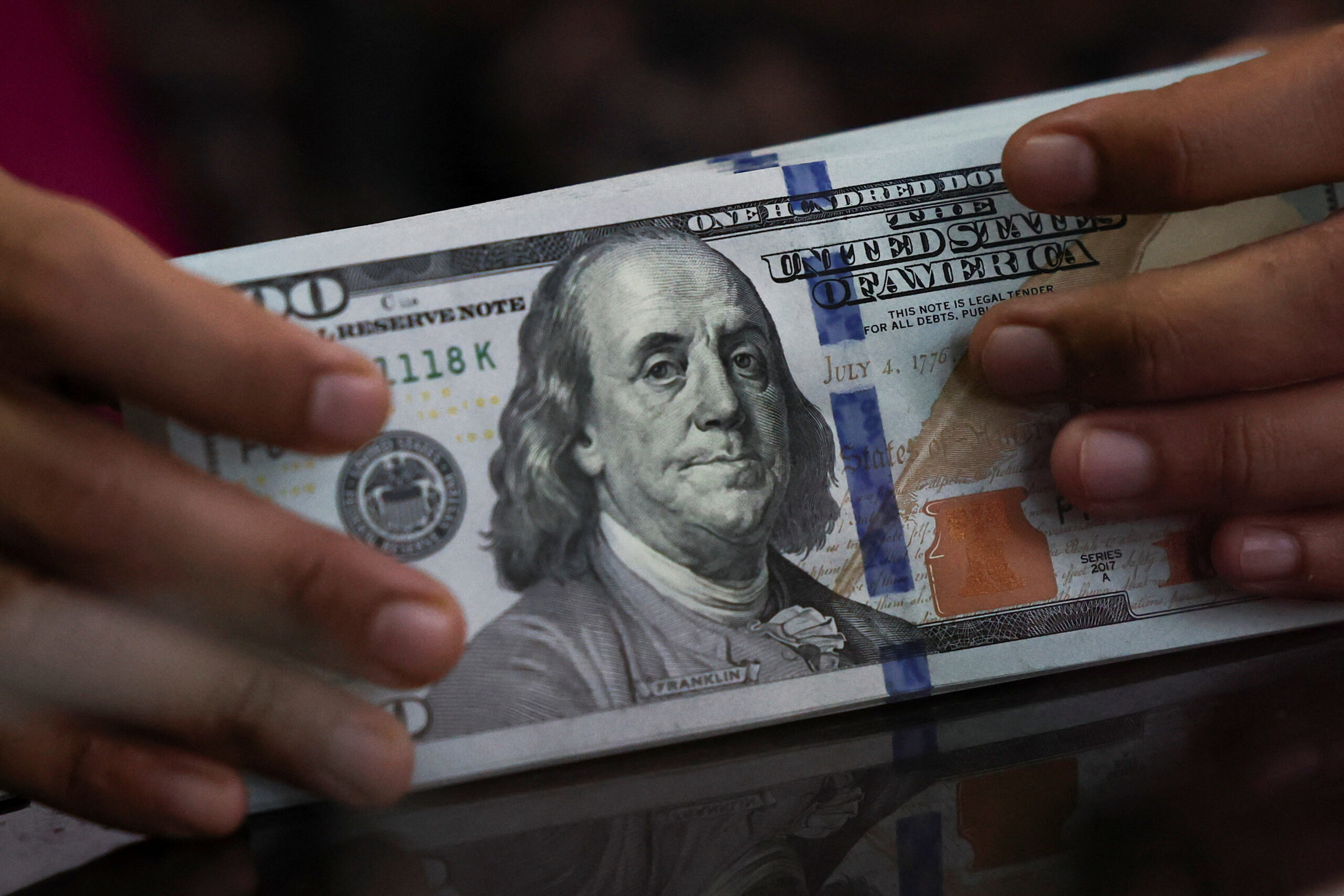 US dollar firms on renewed inflation risks; market pares back rate-cut outlook 