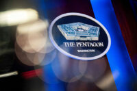 The Pentagon logo is seen behind the podium in the briefing room at the Pentagon in Arlington, Virginia, U.S., January 8, 2020. REUTERS/Al Drago/File Photo