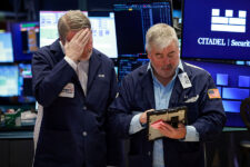 Traders work on the floor at the New York Stock Exchange (NYSE) in New York City, U.S., March 9, 2026. REUTERS/Brendan McDermid