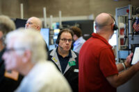 Futures-options traders work on the floor at the New York Stock Exchange's NYSE American (AMEX) in New York City, U.S., March 9, 2026. REUTERS/Brendan McDermid