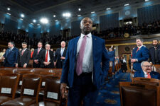 Senator Tim Scott, Republican of South Carolina, stands at the House Chamber before U.S. President Donald J. Trump delivers the first State of the Union address of his second term to a joint session of Congress in the House Chamber of the United States Capitol in Washington, D.C., on Tuesday, February 24, 2026. Kenny Holston/Pool via REUTERS