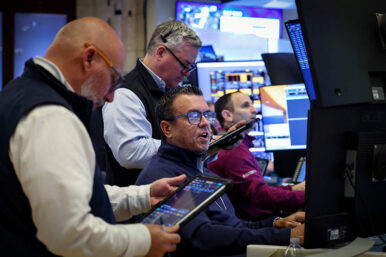 Traders work on the floor at the New York Stock Exchange (NYSE) in New York City, U.S., March 6, 2026. REUTERS/Brendan McDermid