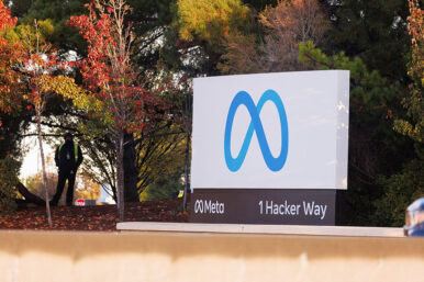A security guard stands watch by the Meta sign outside the headquarters of Facebook parent company Meta Platforms Inc in Mountain View, California, U.S. November 9, 2022. REUTERS/Peter DaSilva