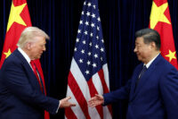 U.S. President Donald Trump shakes hands with Chinese President Xi Jinping as they hold a bilateral meeting at Gimhae International Airport, on the sidelines of the Asia-Pacific Economic Cooperation (APEC) summit, in Busan, South Korea, October 30, 2025. REUTERS/Evelyn Hockstein/File Photo