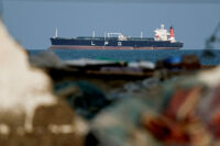 An LPG gas tanker at anchor as traffic is down in the Strait of Hormuz, amid the U.S.-Israeli conflict with Iran, in Shinas, Oman, March 11, 2026. REUTERS/Benoit Tessier/File Photo
