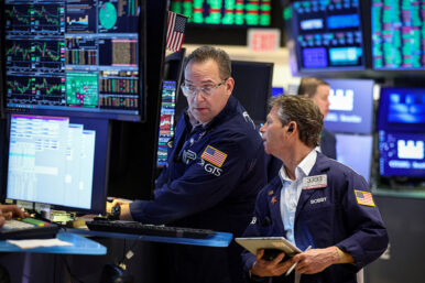 Traders work on the floor at the New York Stock Exchange (NYSE) in New York City, U.S., March 16, 2026. REUTERS/Brendan McDermid