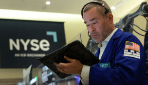 A Futures-options trader works on the floor at the New York Stock Exchange's NYSE American (AMEX) in New York City, U.S., March 17, 2026. REUTERS/Brendan McDermid