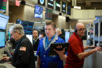 Futures-options traders work on the floor at the New York Stock Exchange's NYSE American (AMEX) in New York City, U.S., March 18, 2026. REUTERS/Brendan McDermid