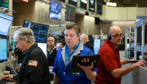 Futures-options traders work on the floor at the New York Stock Exchange's NYSE American (AMEX) in New York City, U.S., March 18, 2026. REUTERS/Brendan McDermid