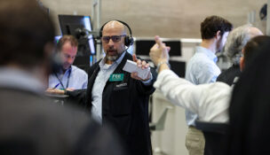 Futures-options traders work on the floor at the New York Stock Exchange's NYSE American (AMEX) in New York City, U.S., March 23, 2026. REUTERS/Brendan McDermid