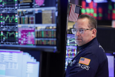 A trader works on the floor at the New York Stock Exchange (NYSE) in New York City, U.S., March 24, 2026. REUTERS/Jeenah Moon