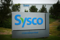 A Sysco sign is shown outside one of their distribution centers in Poway, California, U.S. February 6, 2017. REUTERS/Mike Blake/File Photo