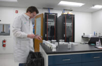 William Hedley, operations manager for Aclara Resources' Blacksburg pilot plant, works in the lab. Photo courtesy Aclara Resources