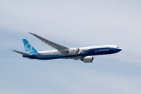 The Boeing B777-9 seen in the aerial display during the media preview for the Singapore Airshow in Singapore on Feb. 13, 2022. Photo by Reuters/Caroline Chia