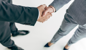 Bank mergers and acquisitions are in the air, thanks to higher stock prices and looser federal regulations. Photo by Depositphotos