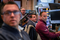 Traders work on the floor at the New York Stock Exchange (NYSE) in New York City on March 24, 2026. Photo by Reuters/Jeenah Moon