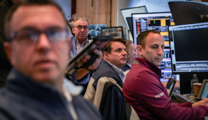 Traders work on the floor at the New York Stock Exchange (NYSE) in New York City on March 24, 2026. Photo by Reuters/Jeenah Moon